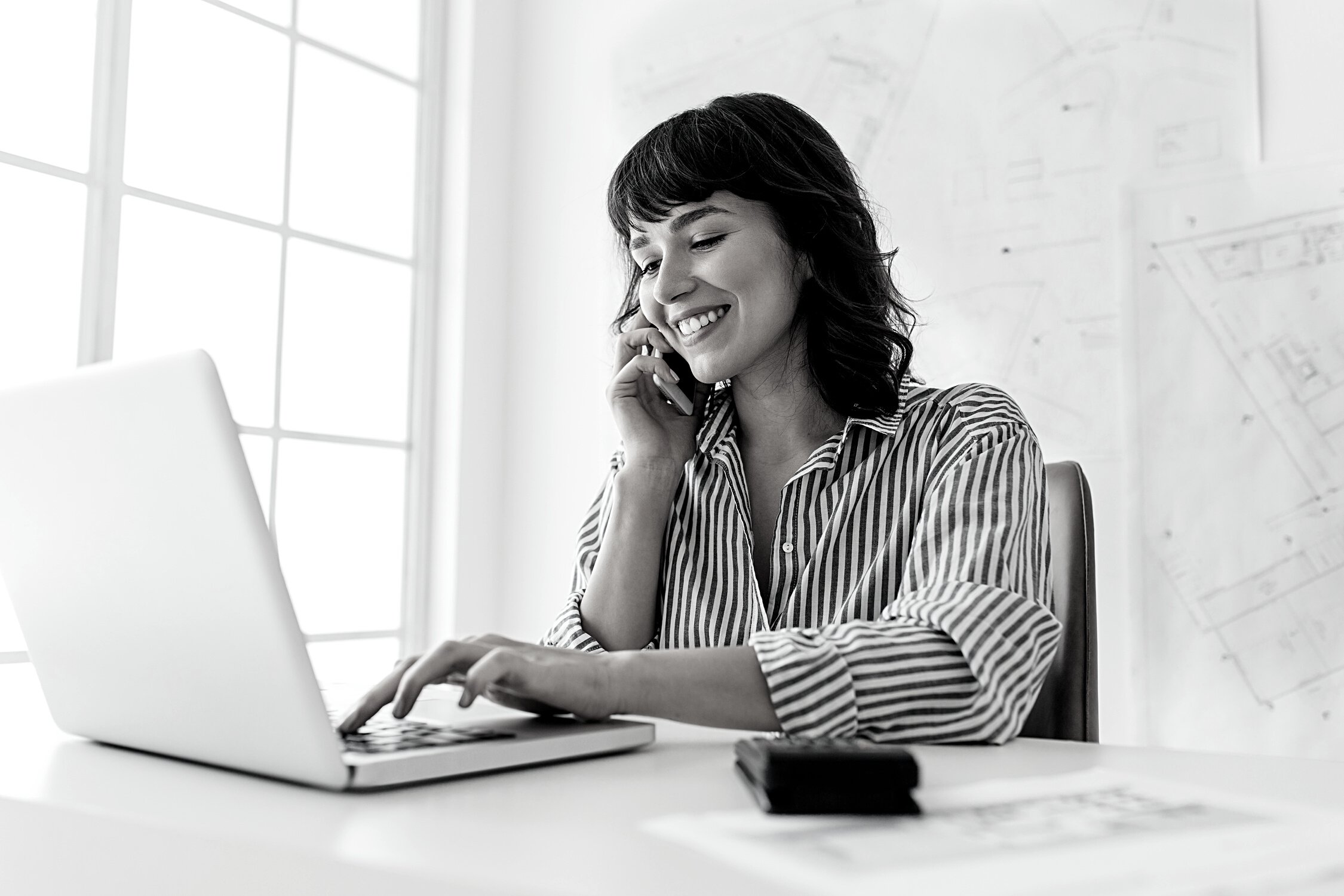 Woman entrepreneur working in office